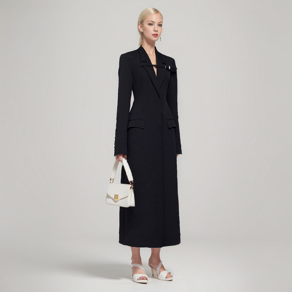 A niche design with a waist cinching and slimming windbreaker for women, featuring a minimalist and trendy style with decorative loops and a long coat