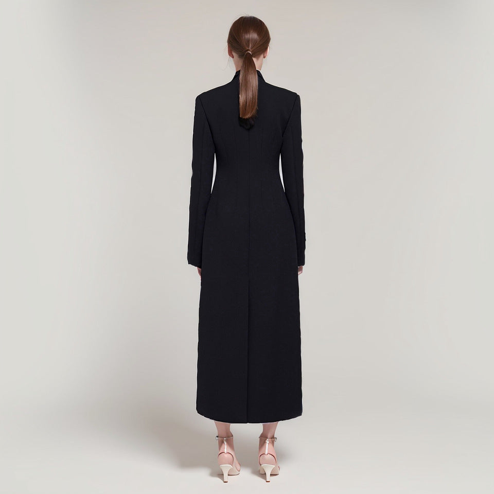 A niche design with a waist cinching and slimming windbreaker for women, featuring a minimalist and trendy style with decorative loops and a long coat