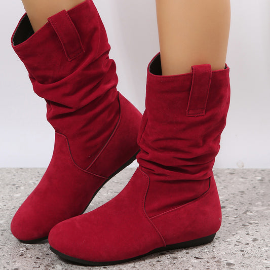 Botas de mujer de punta redonda con costuras de gamuza y suela plana de gran tamaño