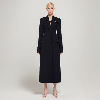 A niche design with a waist cinching and slimming windbreaker for women, featuring a minimalist and trendy style with decorative loops and a long coat