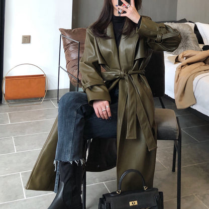 Elegante abrigo verde holgado con cordones