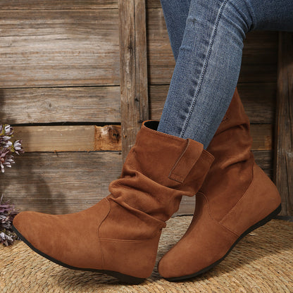 Botas de mujer de punta redonda con costuras de gamuza y suela plana de gran tamaño